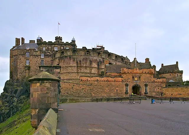 The castle Esplanade at the opening of the day, with the gatehouse and the castle walls seen across the empty parade ground